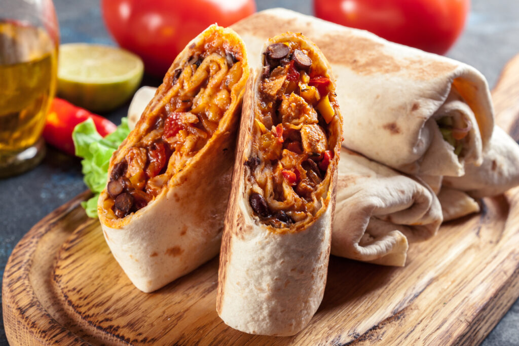 Burritos wraps with mincemeat, beans and vegetables